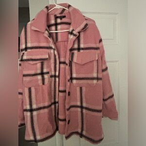 Pink flannel jacket.
